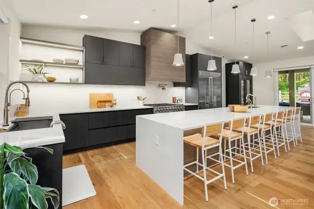 This exceptional estate boasts premier luxury appliances, the very same chosen by acclaimed chefs for their personal kitchens and fine dining establishments. Waterfall island centerpiece with prep sink and ample seating for seven guests