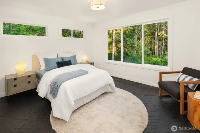 Upstairs MIL suite includes the fourth bedroom, highlighted by stunning designer black brick flooring