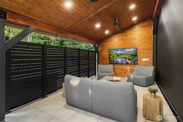Detached flex space is made more private and versatile with a wind-sensor privacy screen