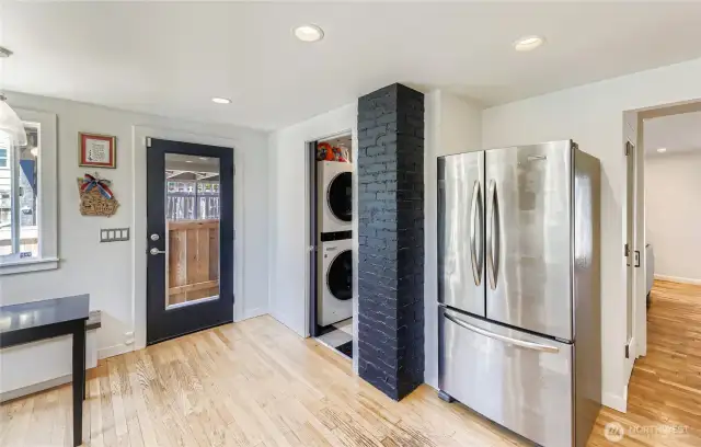 Laundry/Pantry off the Kitchen and just inside the back door for multi-tasking while cooking and easy drop off of groceries when you get home from shopping.