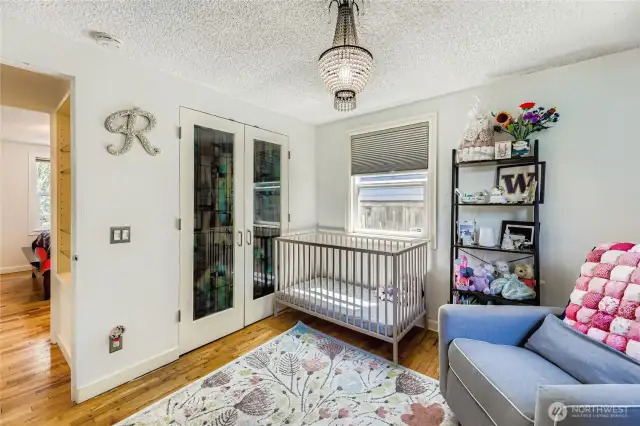 Glass closet doors add interest and personality to the space!