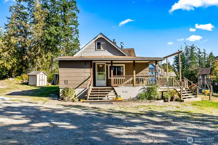 Beautiful home with lots of sun exposure and large deck on lots of acreage
