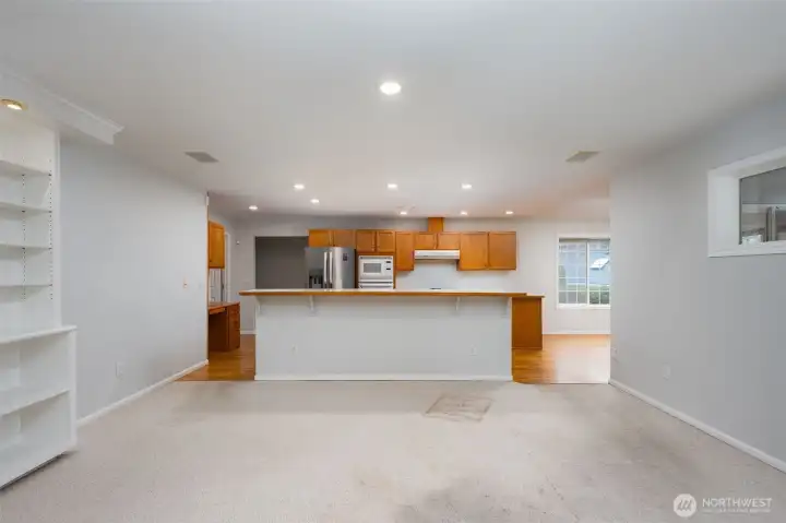 Great room concept with counter with bar space