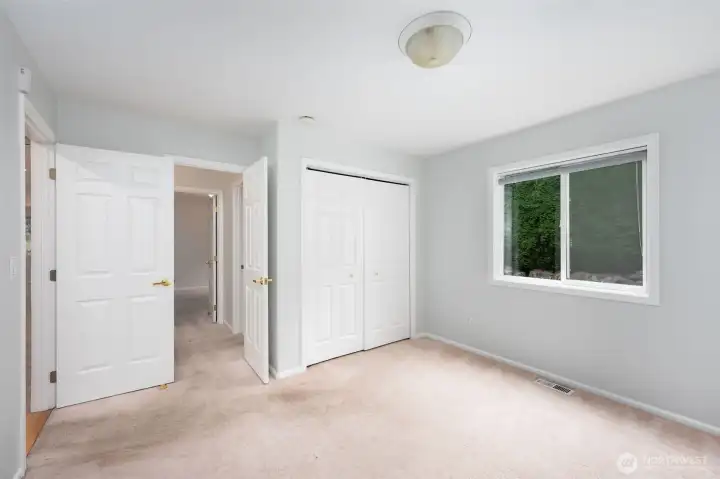 One of two bedrooms with a jack and jill bathroom