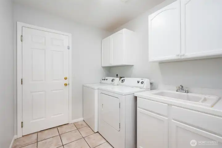 Laundry room off of garage.