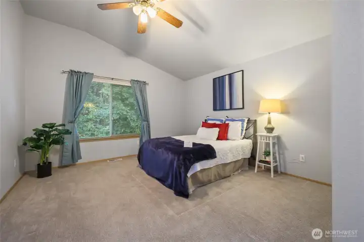 Primary ensuite on second floor, with vaulted ceiling ...