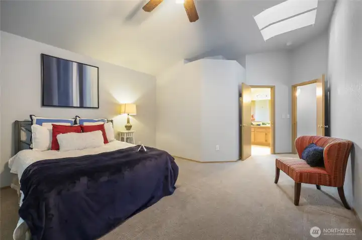 Another view of primary ensuite; note the ceiling fan and skylights!