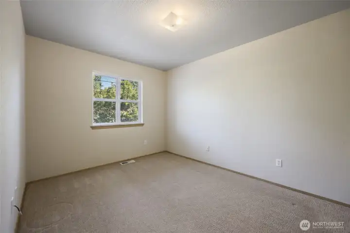 One of the secondary bedrooms ...