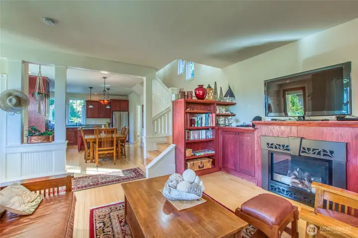 The main level is a great room connecting each space, but with intentional separation created by custom mill work..