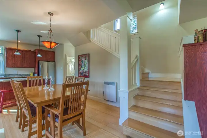Stairs lead up to the second level with custom craftsmen millwork.