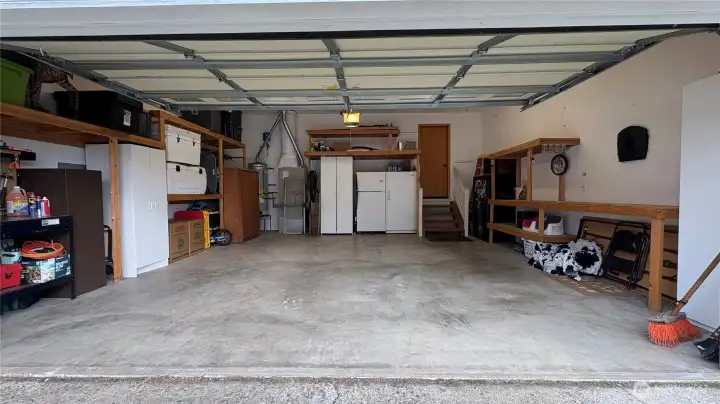 Large 2 car garage with large storage shelving!