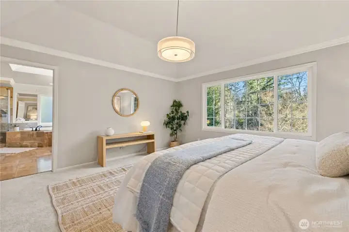 Primary bedroom with an ensuite bathroom