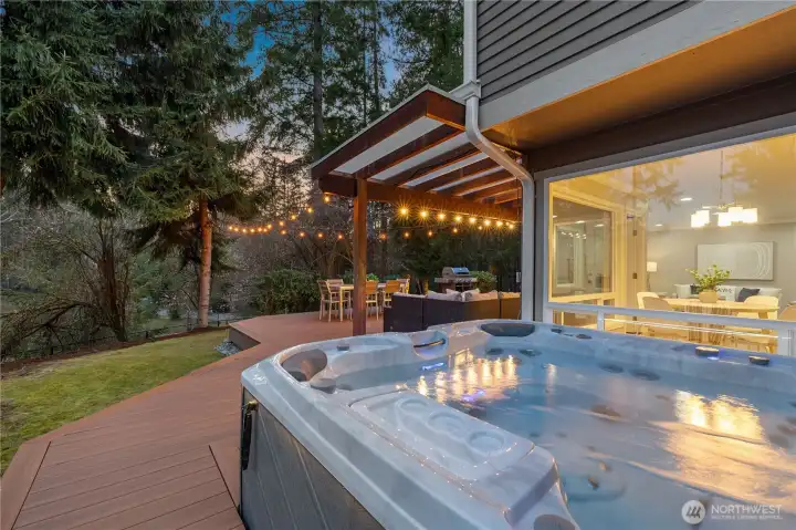Enjoy time in the hot tub and grilling out with friends and family