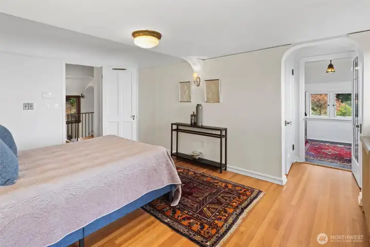 The office, located just past the walk-in closet in the primary suite, provides a private and functional workspace