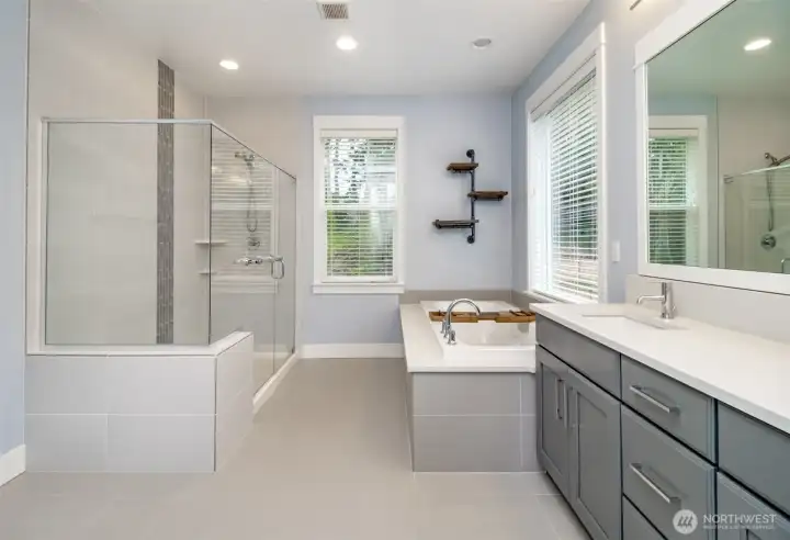 Luxurious spa-like 5 piece ensuite bath. Tiled shower, soaking tub & double sinks