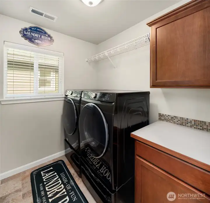 Huge laundry room, washer & dryer.