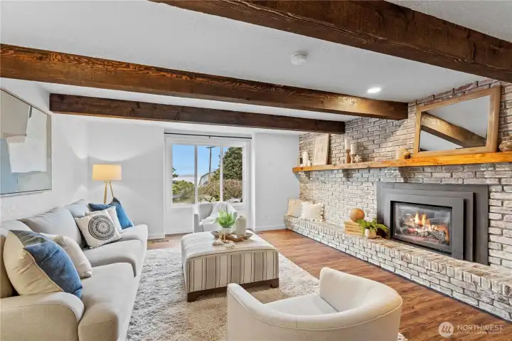 This warm and inviting space off the kitchen just welcomes you to settle in and relax.  Cool nights never felt so embracing!