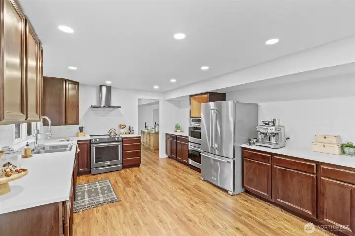 This oversized kitchen is sure to please with ample counter space and room for everything!  Recently refreshed and redesigned, it is ready for summer