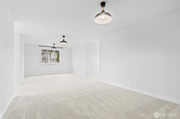 This BONUS room is oversized with built in storage in the eaves.  Perfect play space, work from home space, gaming room or more!