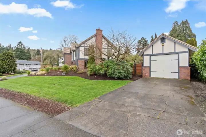The secondary garage, lovingly referred to as the "boat house", tucked into the back of this is also a shop!
