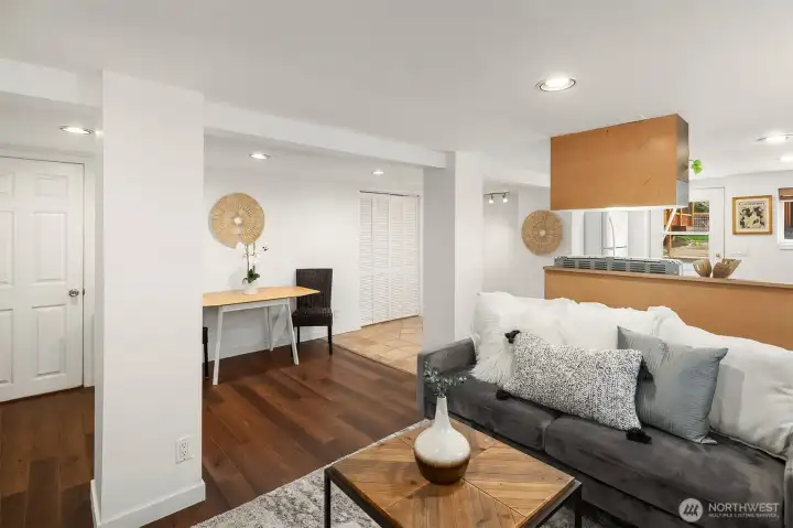 Lower level open floor living room, dining and kitchen