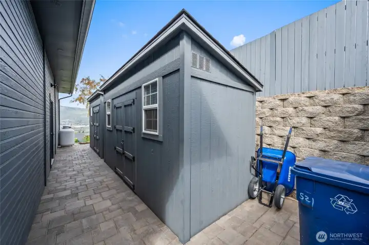 substancial sheds out the back of the garage