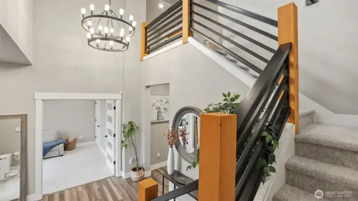 Trendy light fixtures including this modern chandelier.