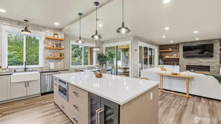 Don't miss the wine fridge and microwave in the oversized island.