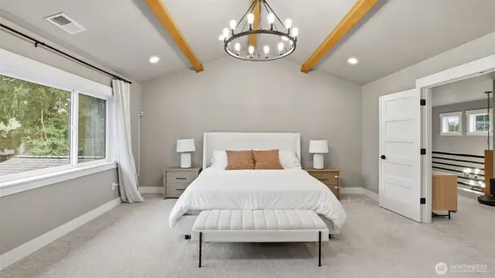 Don't miss the stunning chandelier over the bed