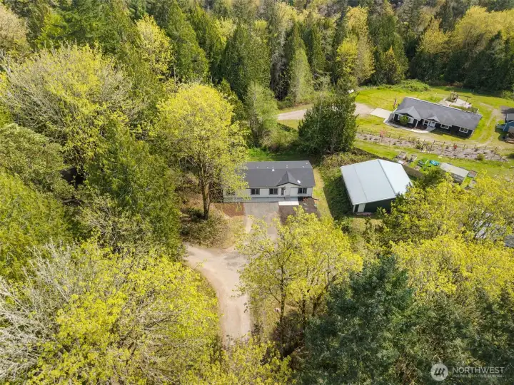 Nearly new home, acreage AND a HUGE shop!