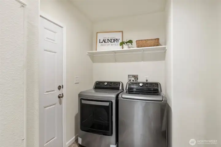 Laundry and door to backyard.