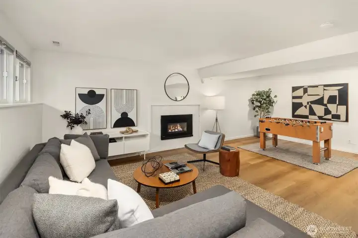 Another perspective of lower-level family room – a great flex space for fun and hanging out!