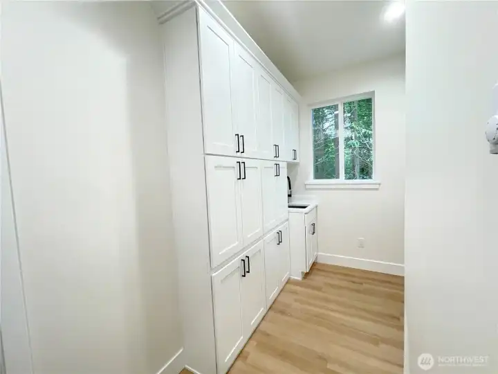 laundry w/lots of cabinet storage and sink! laundry w/lots of cabinet storage and sink!
