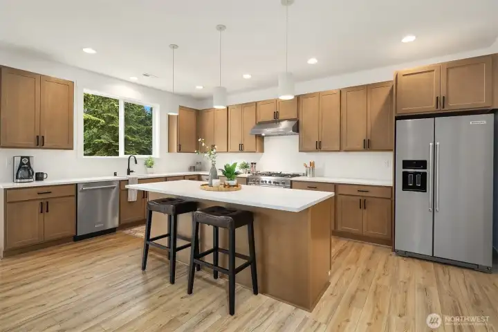 *Interior photos are from model home - Same floorplan, mirrored. **Kitchen cabinets are a dark wood in this Lot.