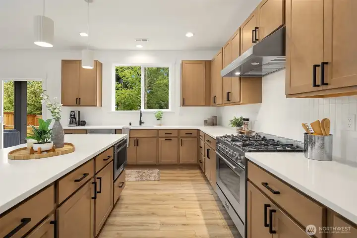 *Interior photos are from model home - Same floorplan, mirrored. **Kitchen cabinets are a dark wood in this Lot.