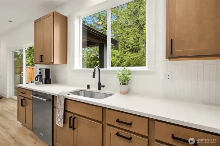 *Interior photos are from model home - Same floorplan, mirrored. **Kitchen cabinets are a dark wood in this Lot.