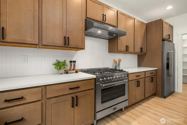 *Interior photos are from model home - Same floorplan, mirrored. **Kitchen cabinets are a dark wood in this Lot.