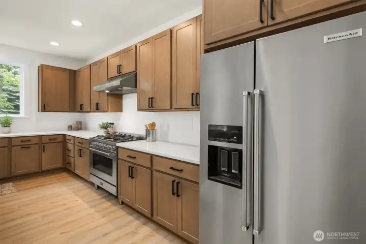 *Interior photos are from model home - Same floorplan, mirrored. **Kitchen cabinets are a dark wood in this Lot.