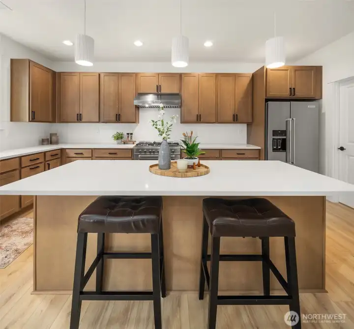 *Interior photos are from model home - Same floorplan, mirrored. **Kitchen cabinets are a dark wood in this Lot.