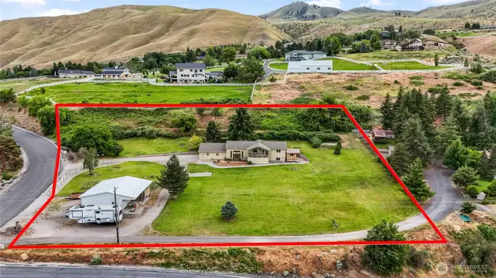 Private 2.06 Lot with 40x40 shop, RV Parking with power and additional 12x14 outbuilding