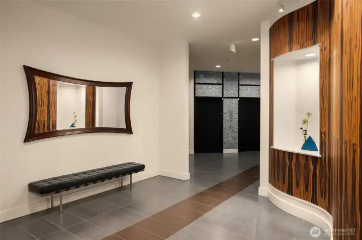Secure lobby with fresh flowers. Secure lobby with fresh flowers.