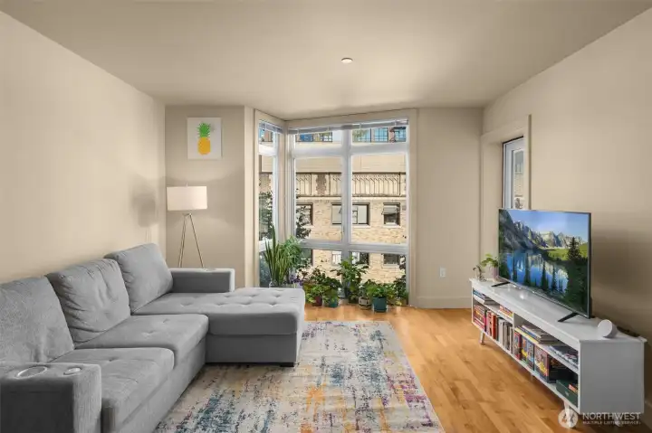 Gorgeous hardwood floors and floor-to-ceiling windows Gorgeous hardwood floors and floor-to-ceiling windows