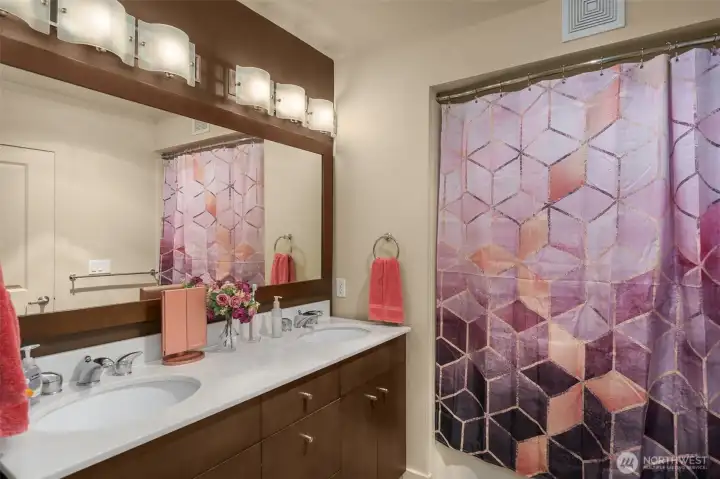 Double vanities in the primary en-suite bathroom Double vanities in the primary en-suite bathroom
