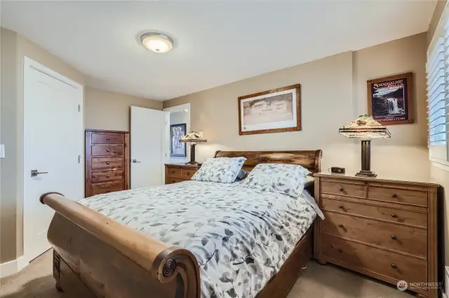 large bedroom with small walk in closet