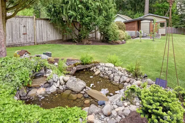 Sit and enjoy the sounds of this pond while you enjoy the back yard.