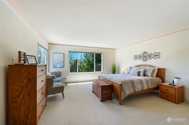 The luxurious primary suite includes a large walk-in closet with built-in organizers and a      en-suite 5-piece bath with a dual sink vanity, step in tile shower, a large soaking tub and    private water closet.