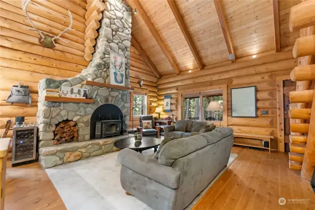 Living room with river rock fire place