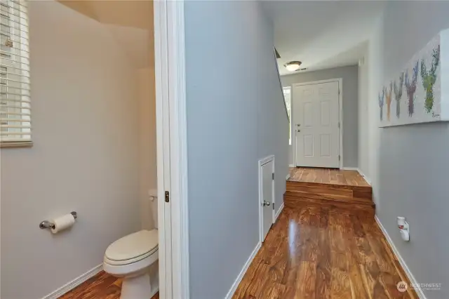 Downstairs powder room off of the entry hall.