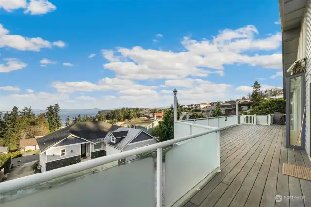 The deck runs the length of the house and has four access points.  Enjoy your morning coffee while taking in the views, relax in the evening and enjoy Camano Island’s famous sunsets.