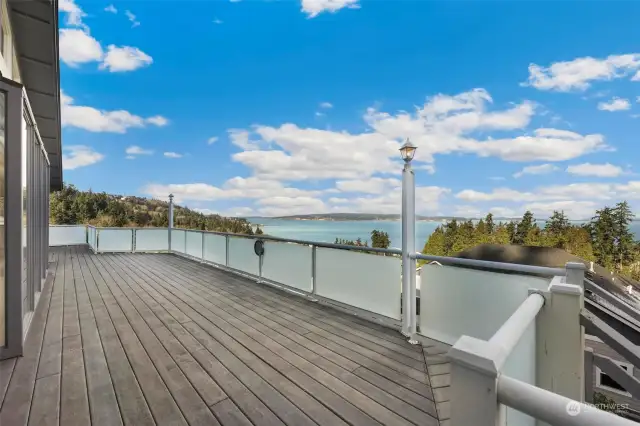 The deck runs the length of the house and has four access points.  Enjoy your morning coffee while taking in the views, relax in the evening and enjoy Camano Island’s famous sunsets.